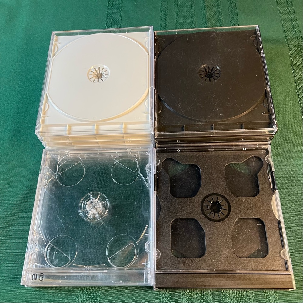 Store 18 CDs - 6 Double Jewel Cases, 6 White Backed Single Jewel Cases
